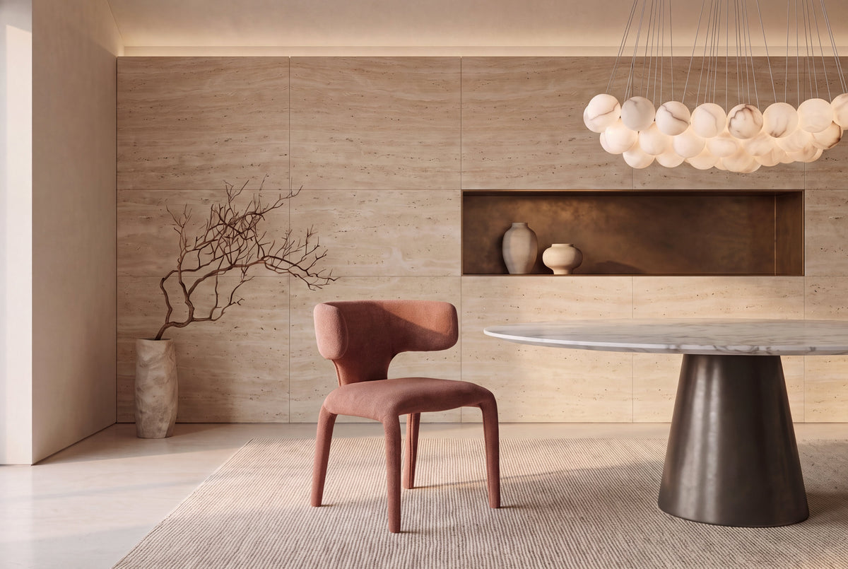 The Nemi Dining Chair in terracotta, fully upholstered curved dining chair, styled in a room