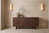 The Noli Fluted Sideboard in walnut, fluted mango wood sideboard, styled in a room