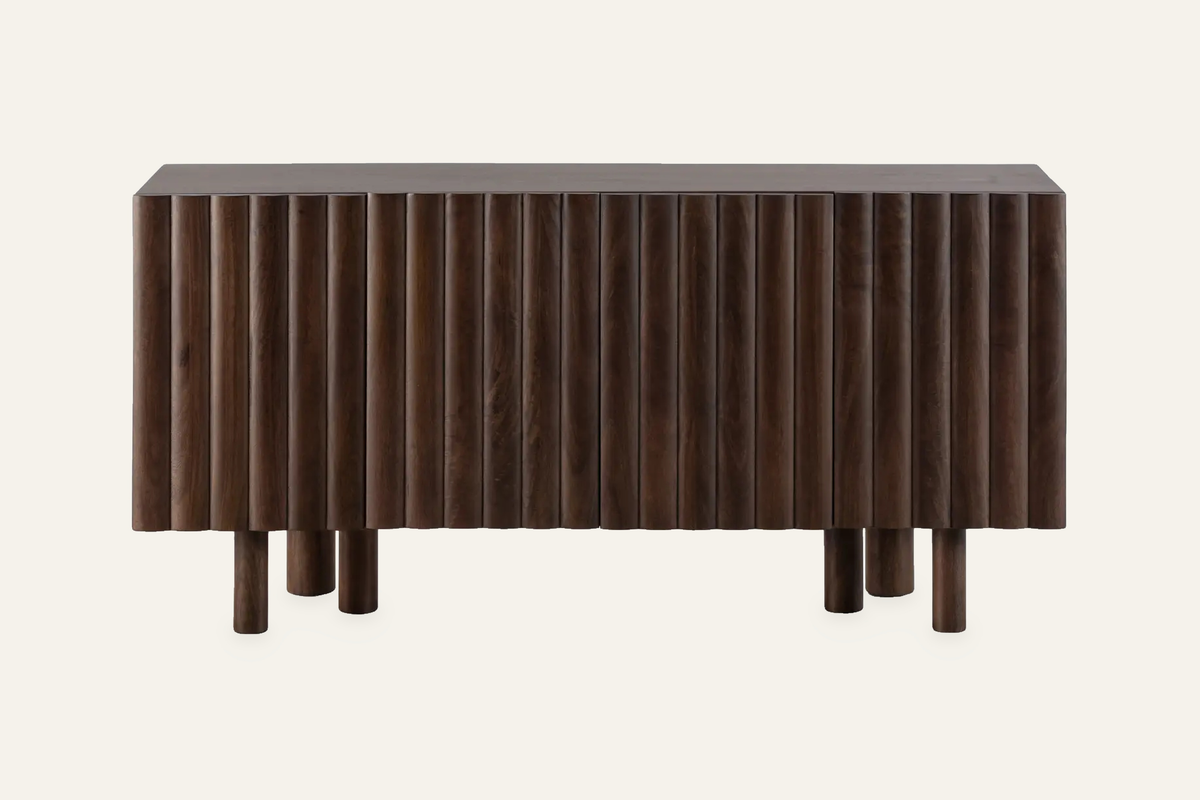 The Noli Fluted Sideboard in walnut, fluted mango wood sideboard, studio view