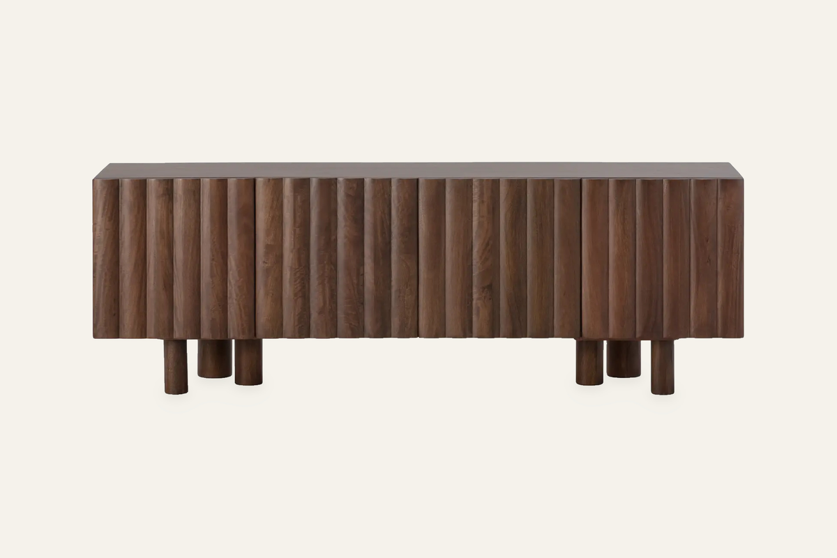 The Noli Fluted TV Unit in walnut, fluted mango wood TV unit, studio view
