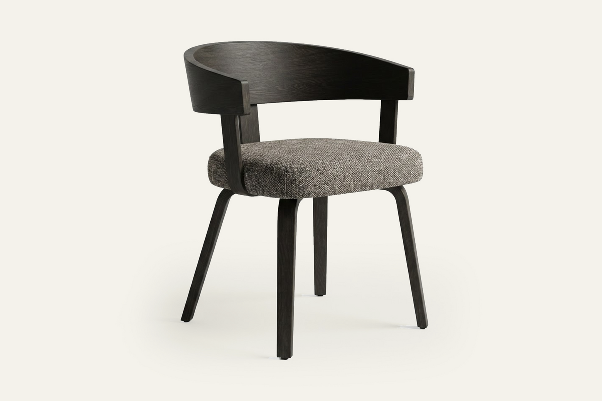 The Novara Dining Chair in grey and dark walnut, dining chair with a curved wooden back, studio view
