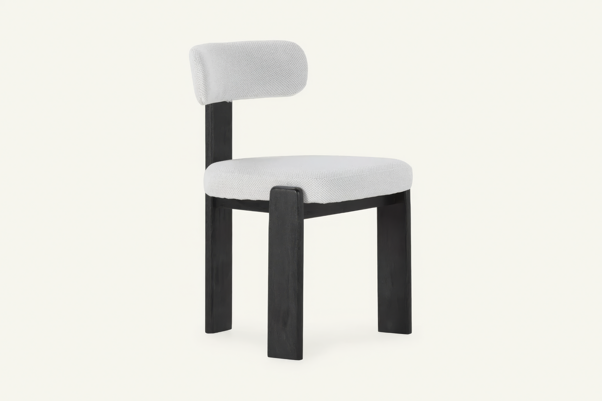 The Orta Dining Chair in ice grey and black, upholstered dining chair on a wooden frame, studio view