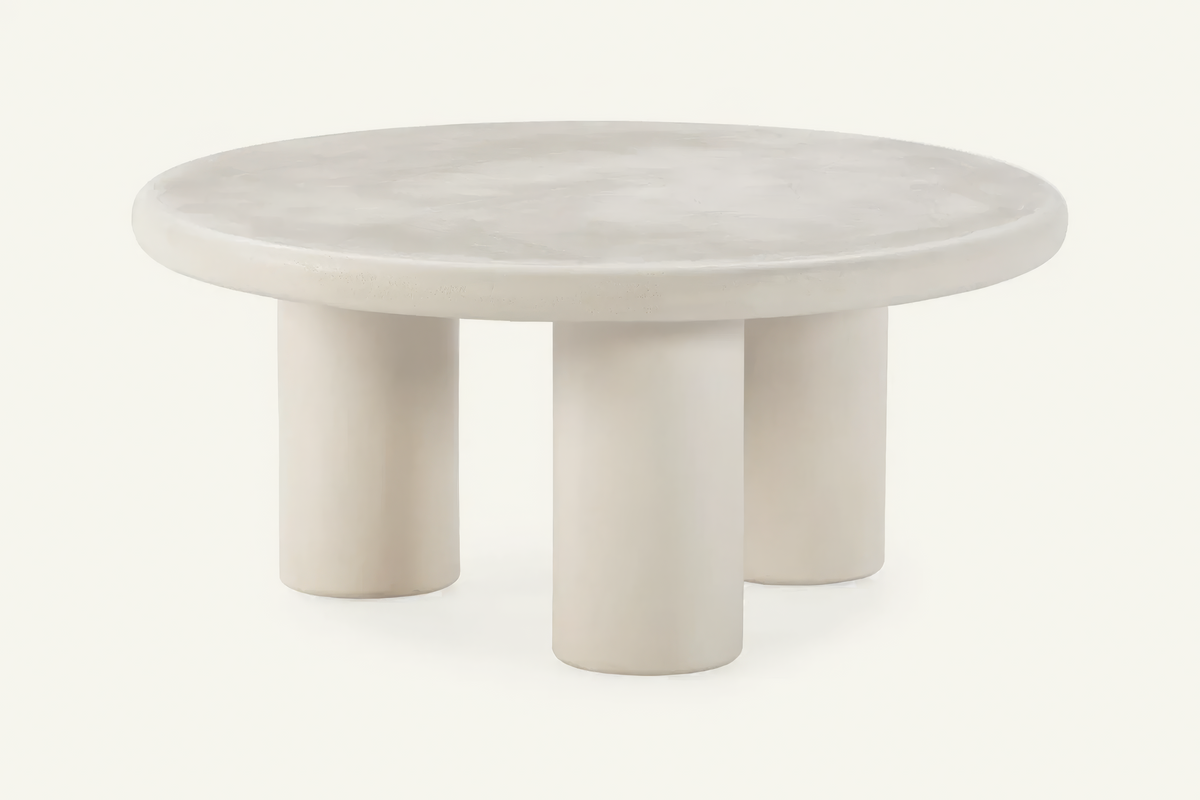 The Otranto Coffee Table, round cream concrete-effect coffee table, studio view