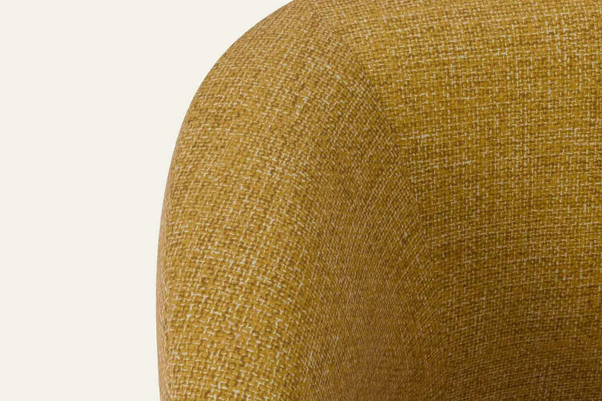 The Pizzo Armchair, close-up of the mustard fabric