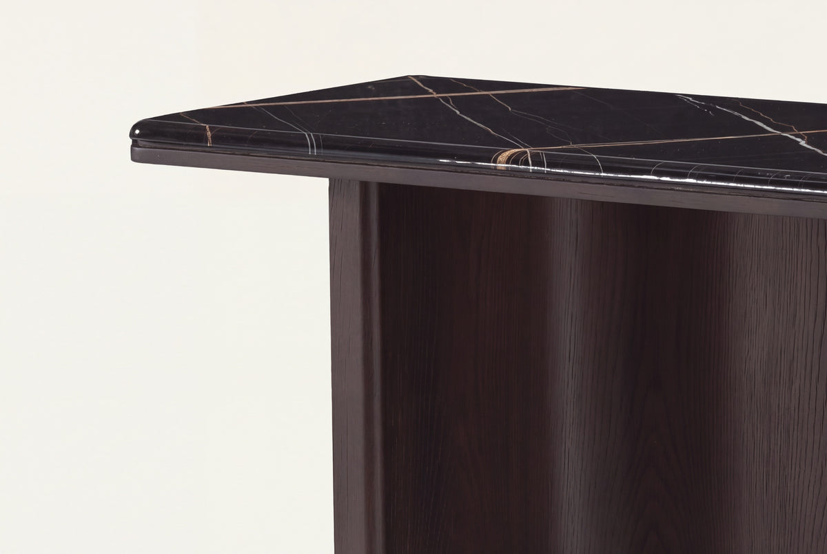 The Sestri Marble Console Table, close-up of the marble top and oak leg