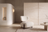 The Sirmione Lounge Chair in ivory boucle on a walnut frame, in a travertine and plaster living room