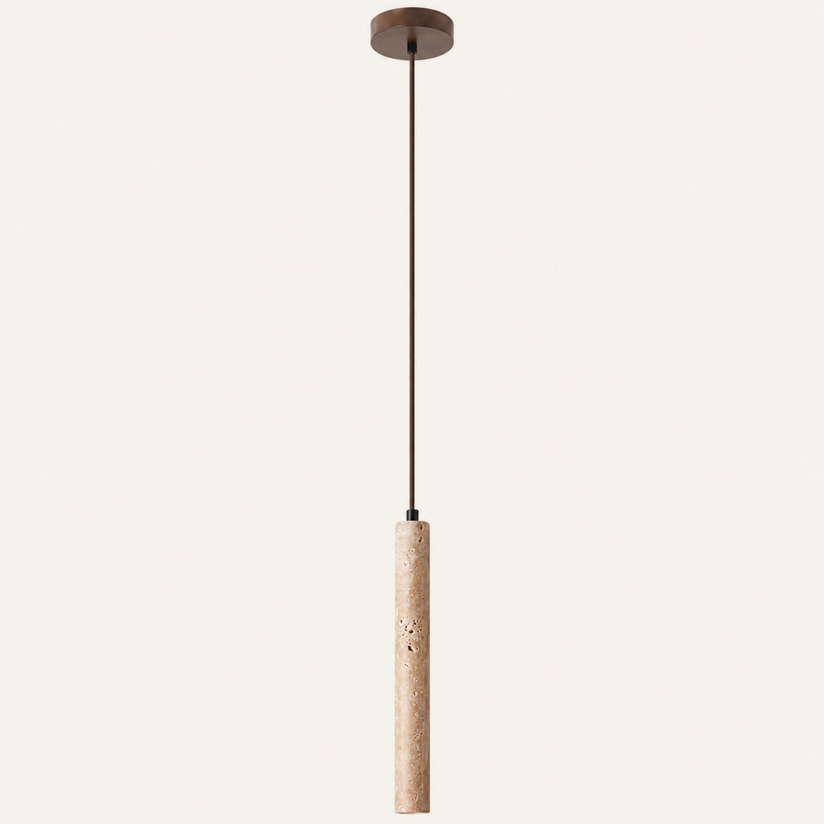 The Stilo travertine pendant light, a long slim stone tube on a fine cable with a wood ceiling plate
