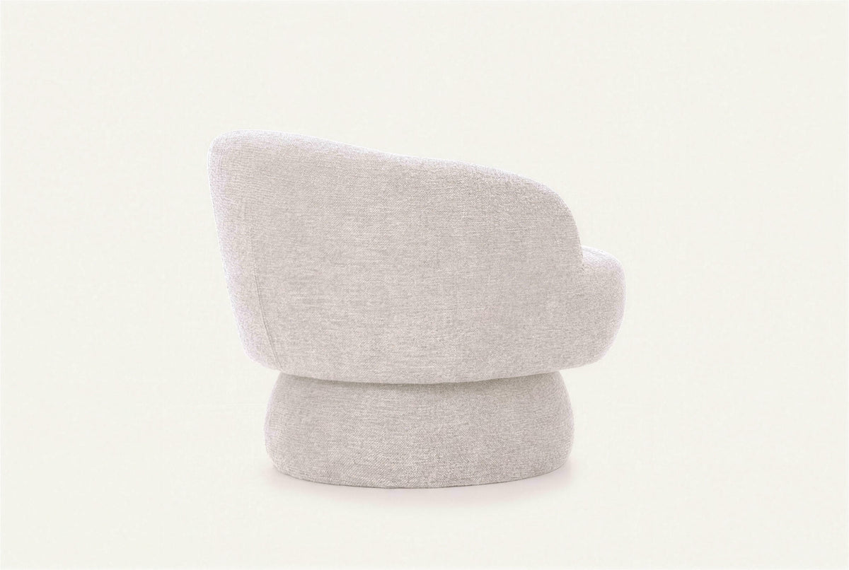The Taormina Swivel Chair in stone, rounded boucle swivel chair, studio view