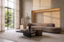 The Melfi Coffee Table Set in black oak and bronze in a double-height plaster living room with a travertine alcove and garden view