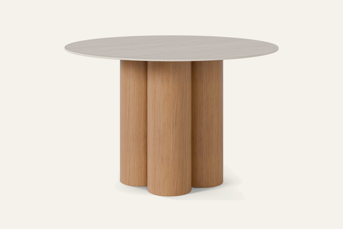 The Zoagli Travertine Finish Round Dining Table with oak base