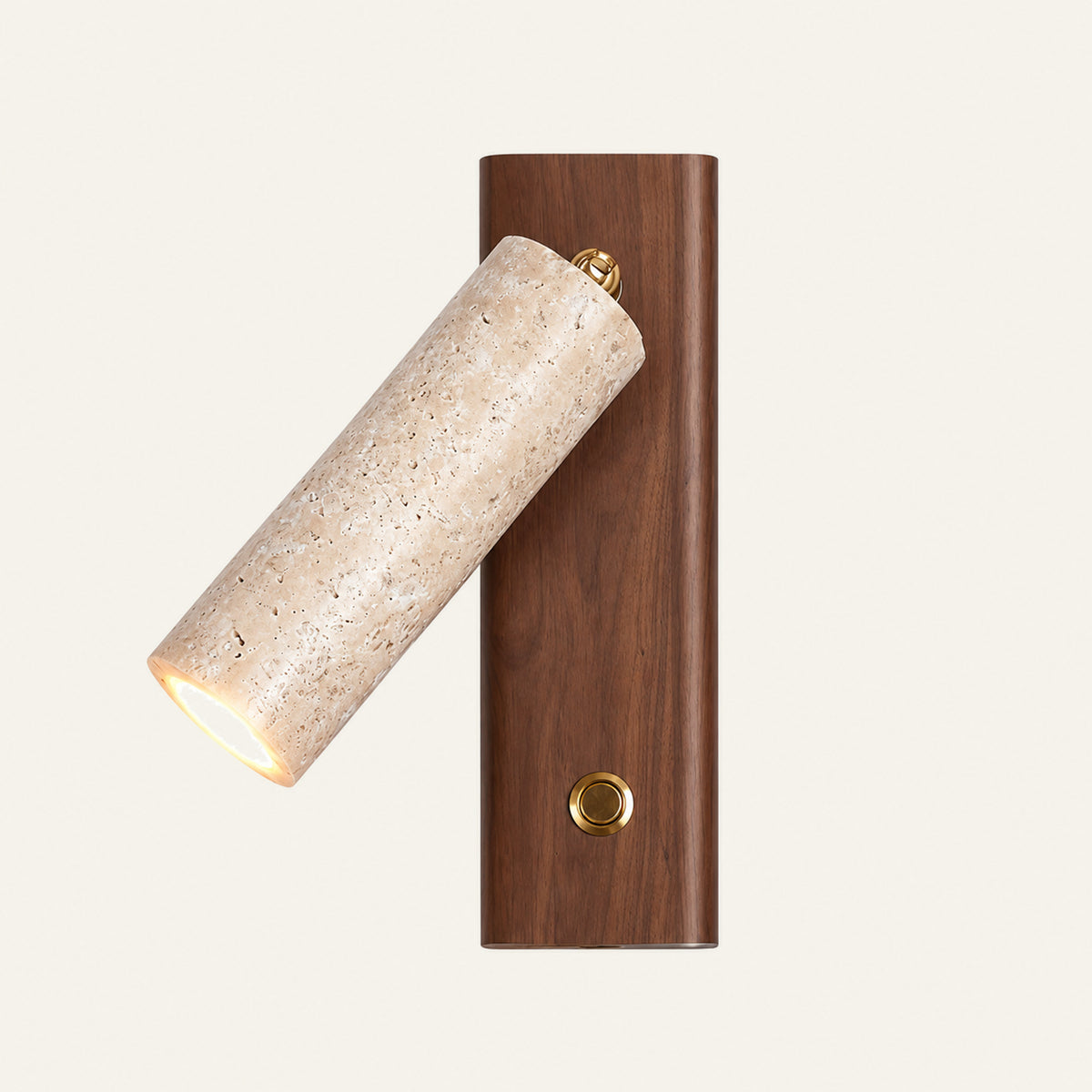 The Lettura travertine wall light with a walnut backplate