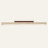 The Linea travertine flush ceiling light, a slim stone bar with a walnut mount