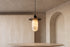 The Lume Alabaster Pendant Light, lifestyle close-up