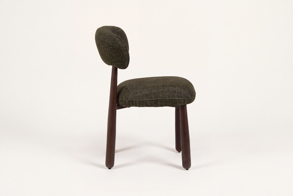 The Mantova Dining Chair in forest green and walnut, side view