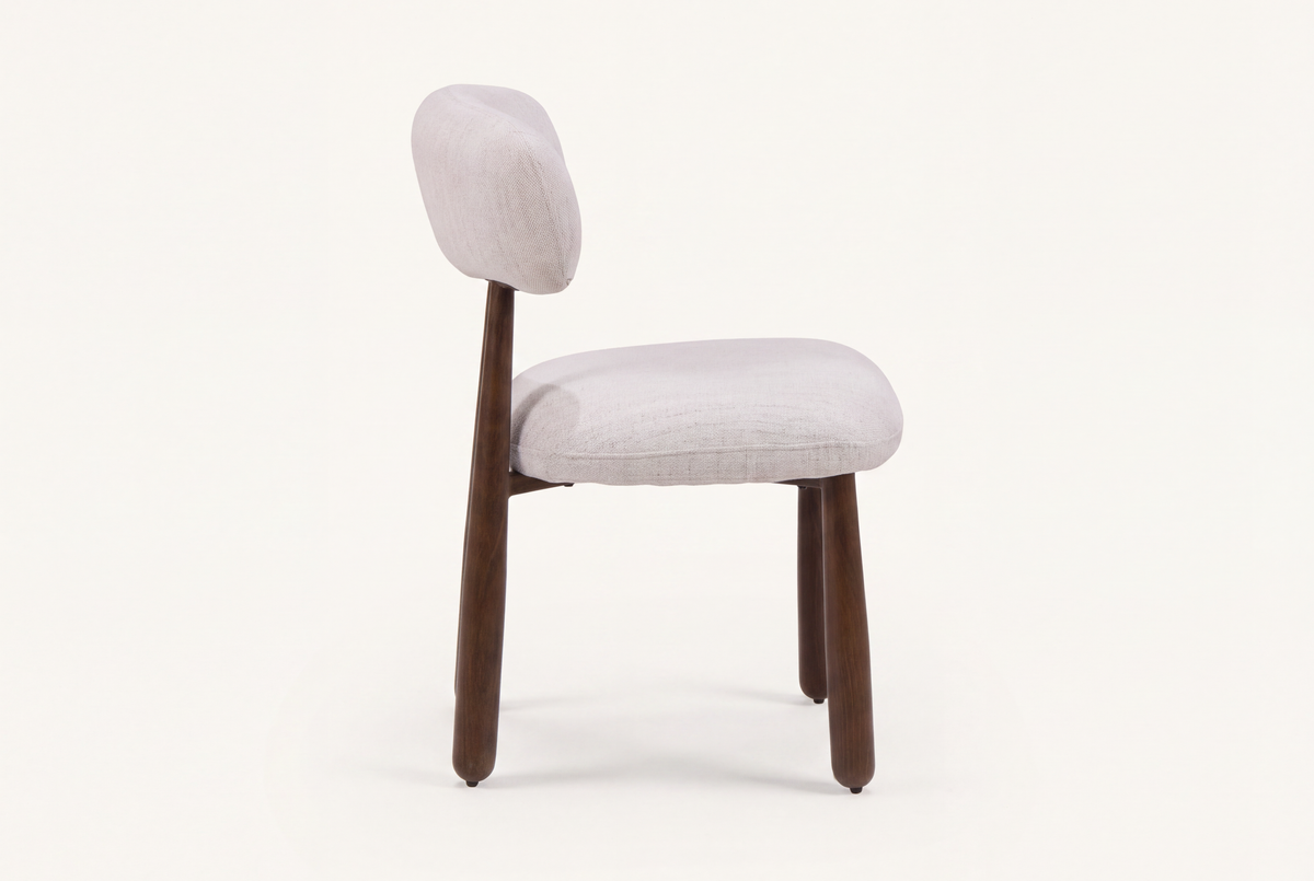 The Mantova Dining Chair in ivory and walnut, side view