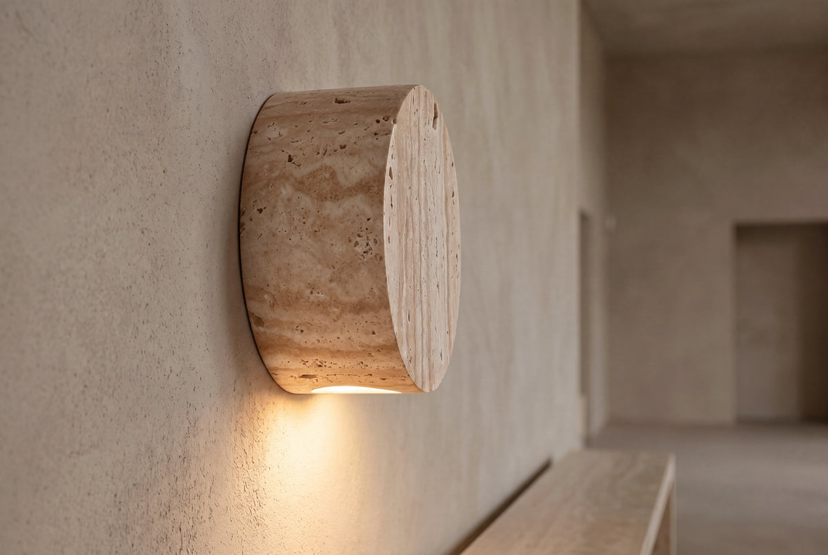 The Medaglia Travertine Wall Light, lifestyle close-up