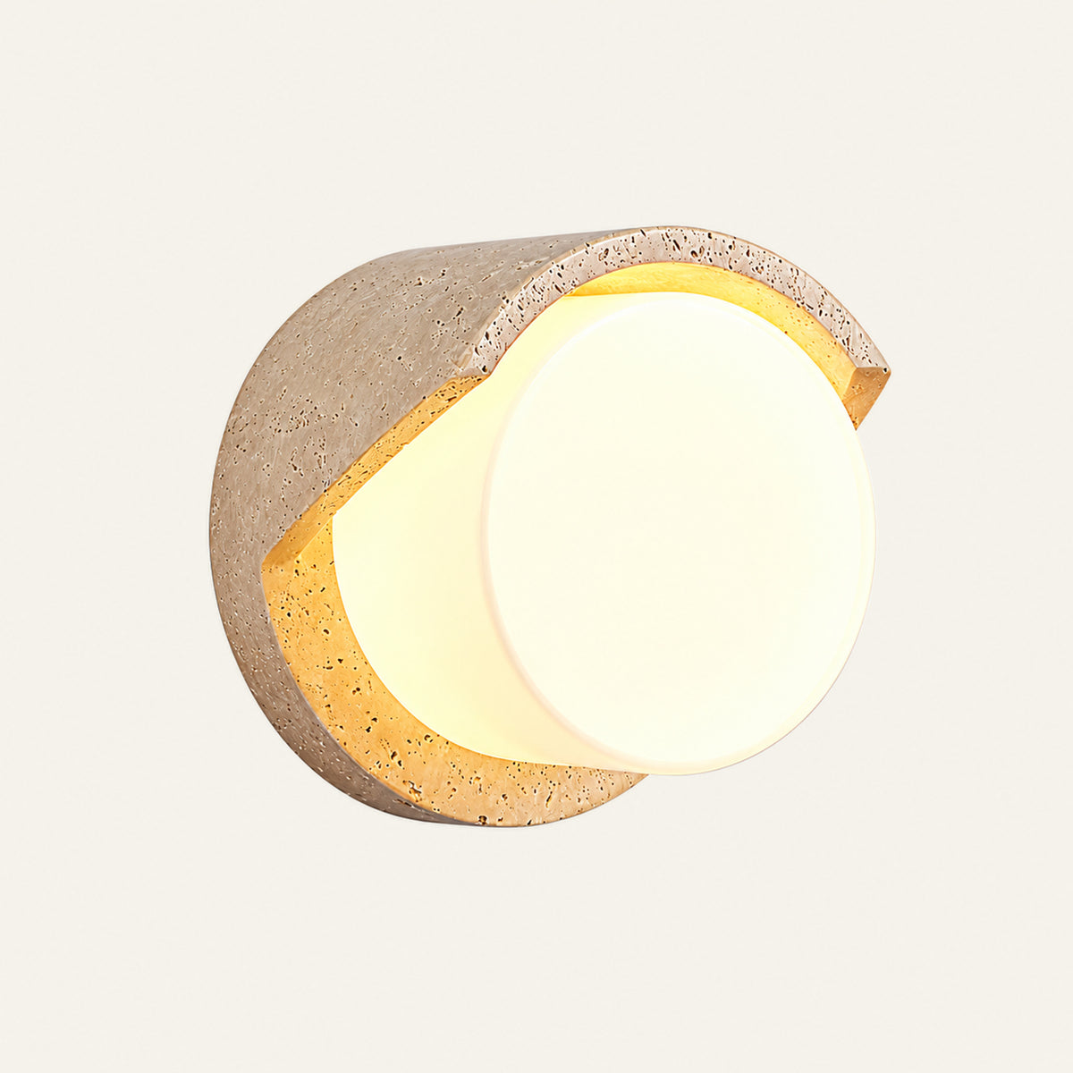 The Mezzaluna travertine wall light, a stone half ring cradling an opal glass disc