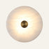 The Moneta alabaster wall light, Ø22cm in brass