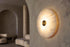 The Moneta Alabaster Wall Light, lifestyle close-up