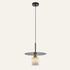 The Ombra alabaster pendant light with a Ø20cm metal disc