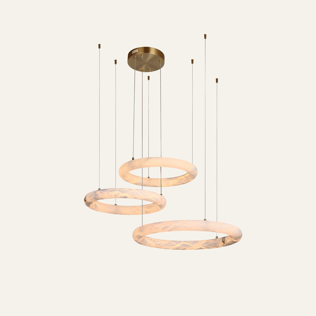 The Orbita alabaster chandelier, three rings in brass