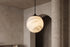 The Perla Alabaster Pendant Light, lifestyle close-up