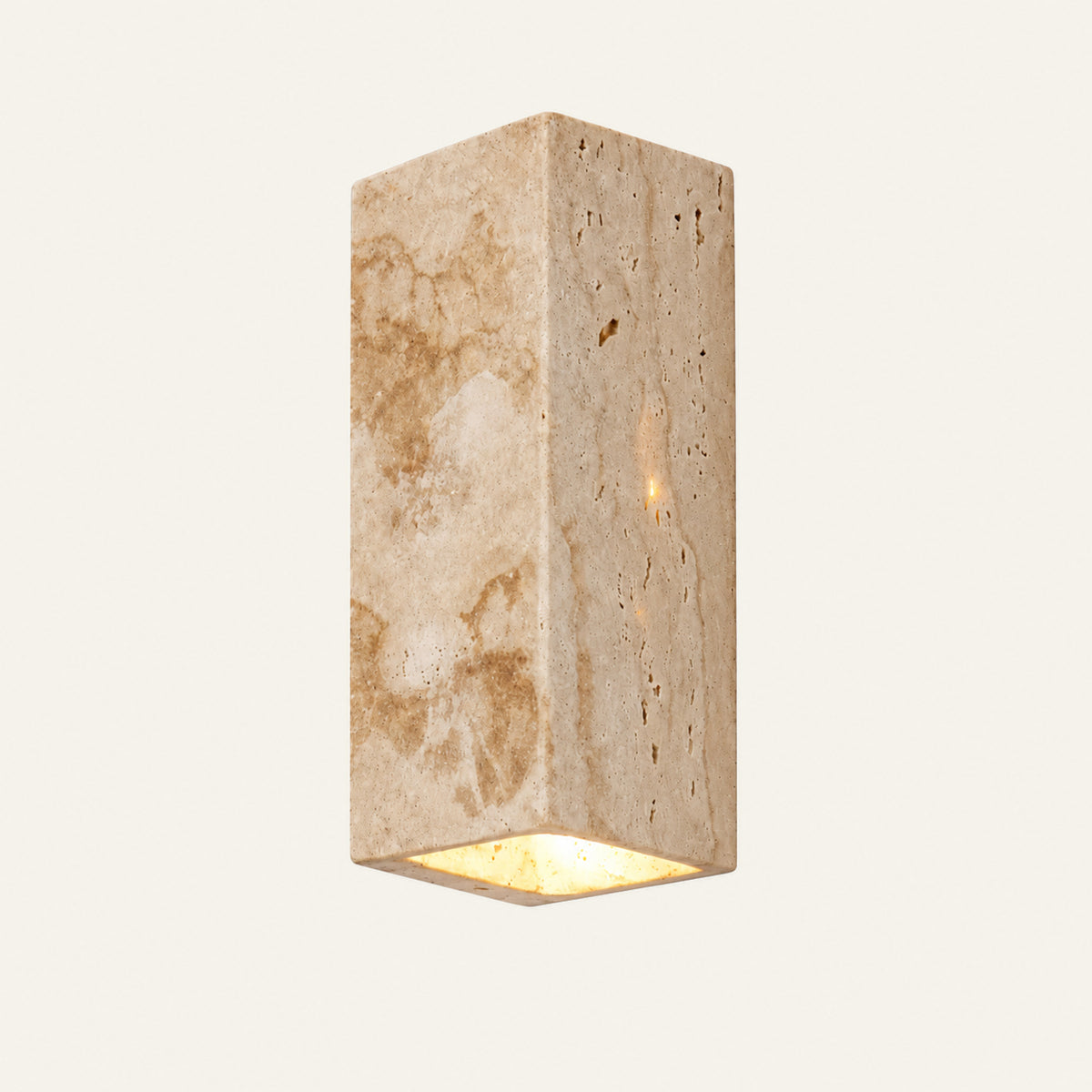 The Pilone travertine wall light, a tall stone block