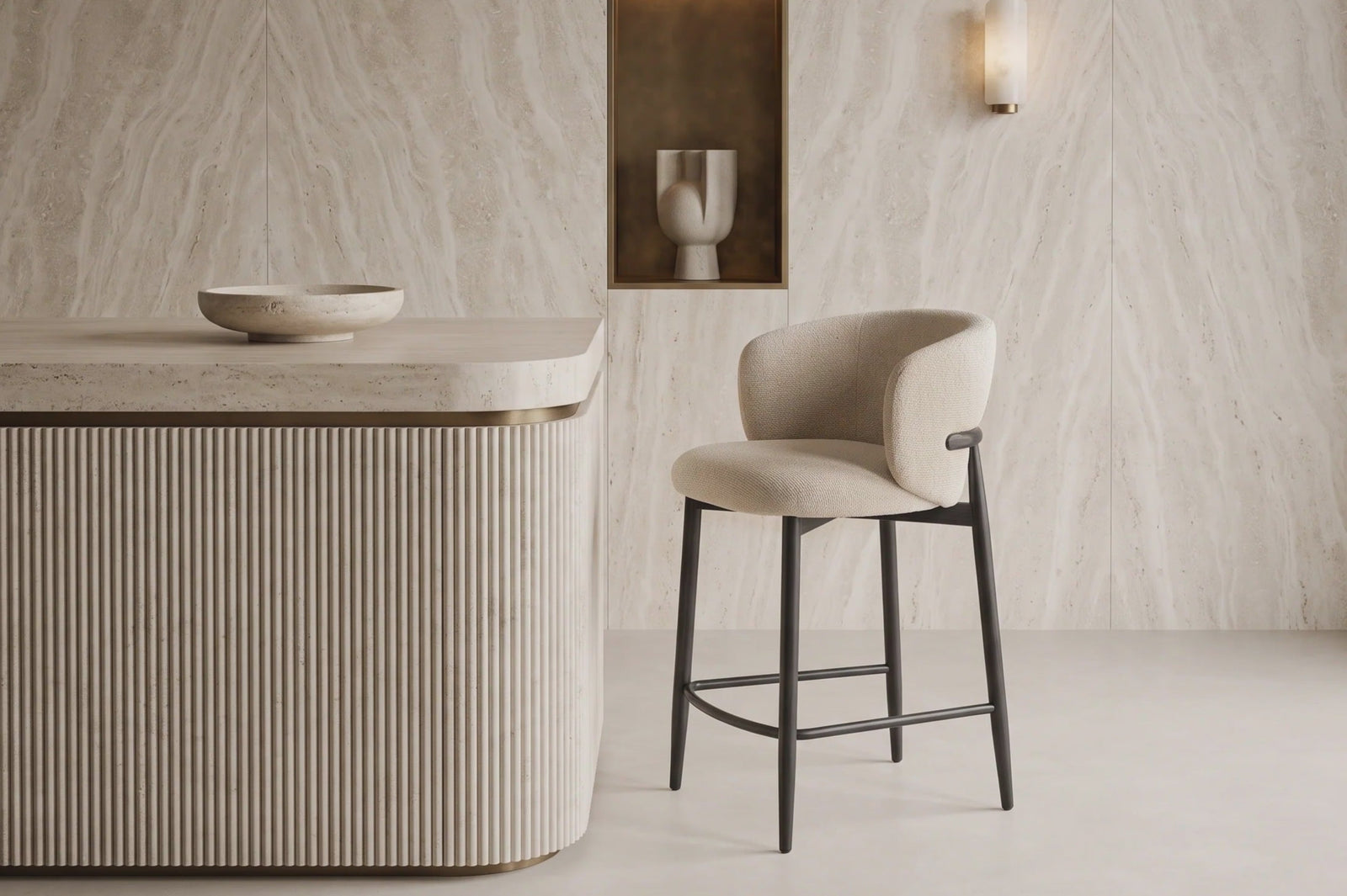 Trevi bar stool beside a fluted travertine island