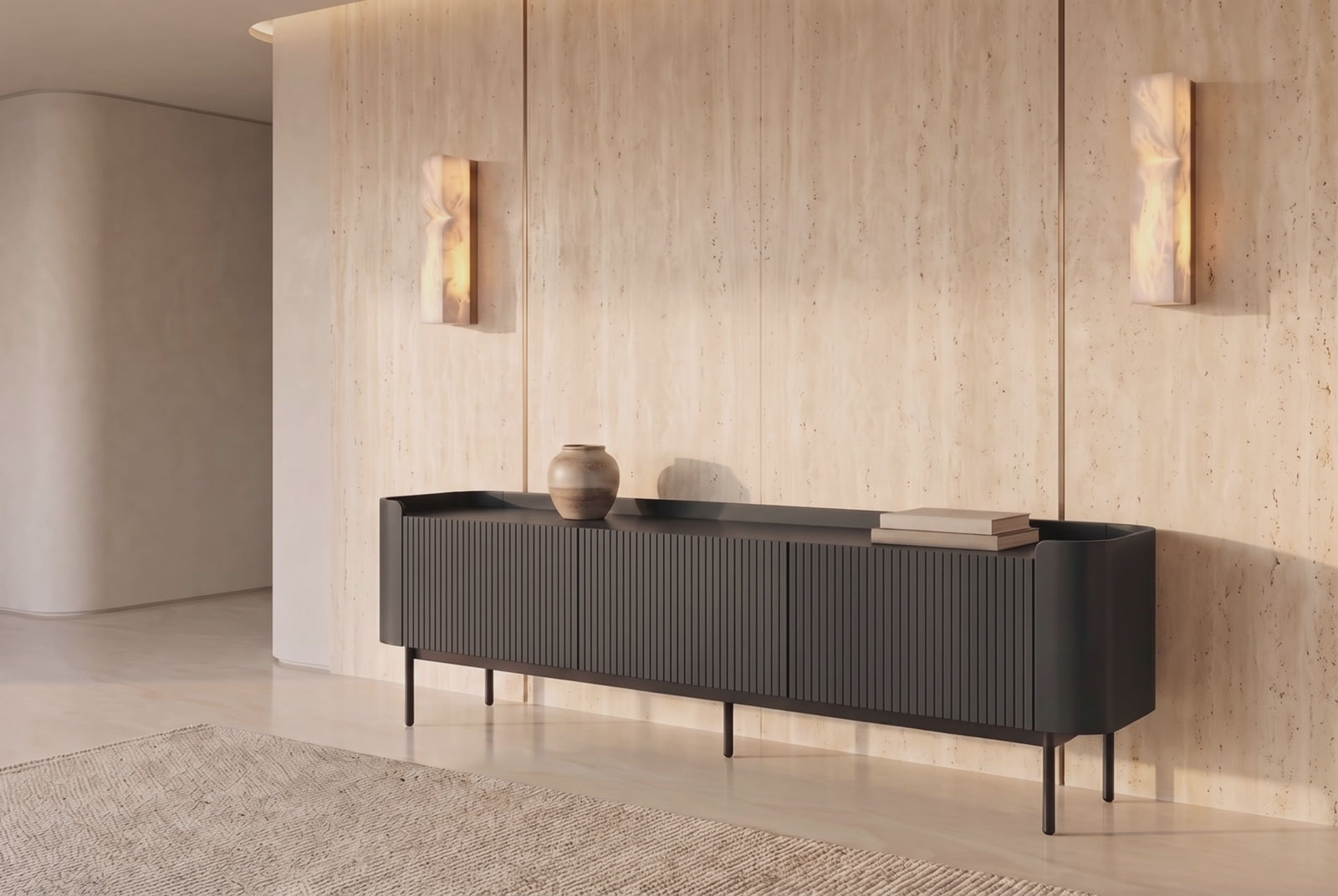 Camogli fluted TV unit in black against a travertine wall