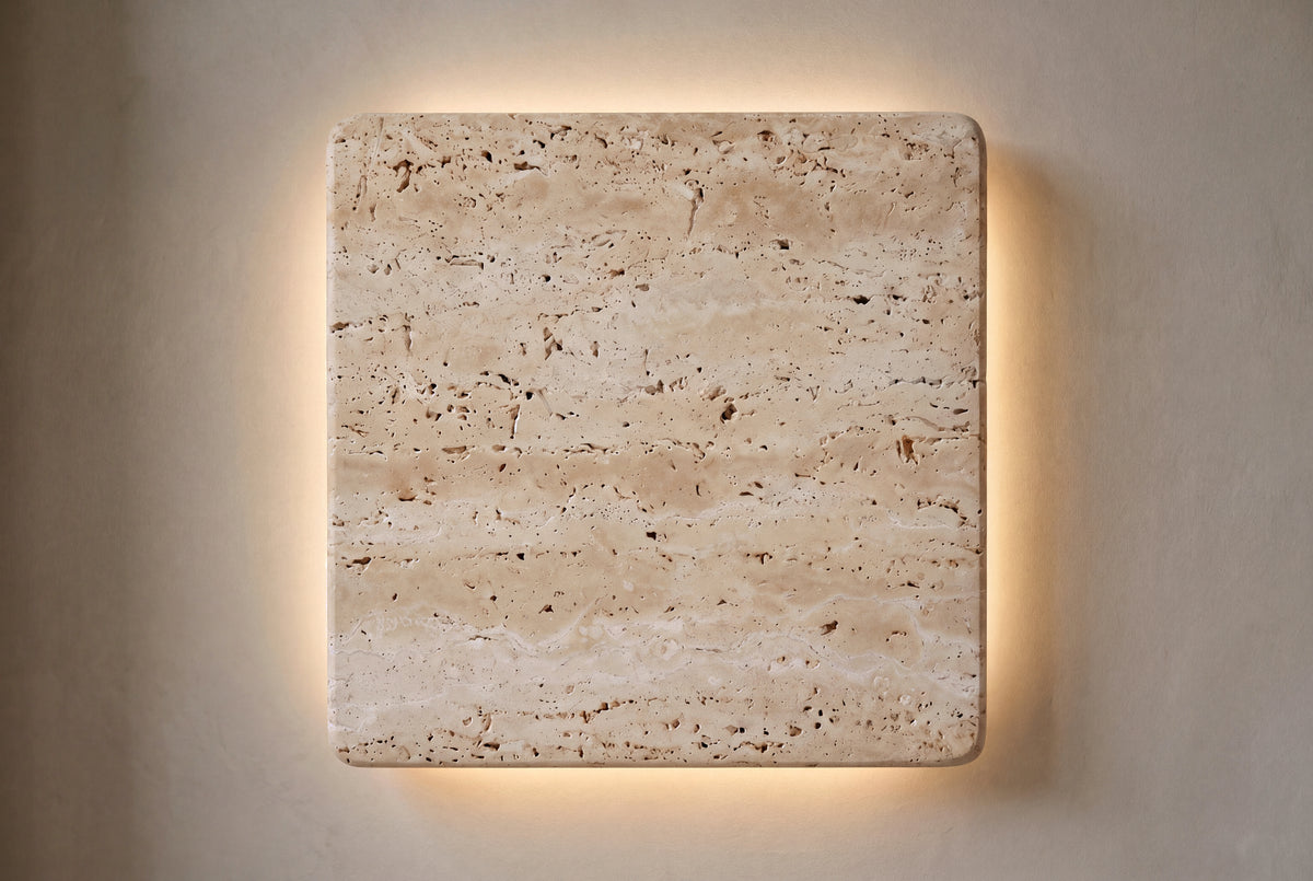The Quadro Travertine Wall Light, lifestyle close-up
