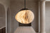 The Roccia Alabaster Pendant Light, lifestyle close-up
