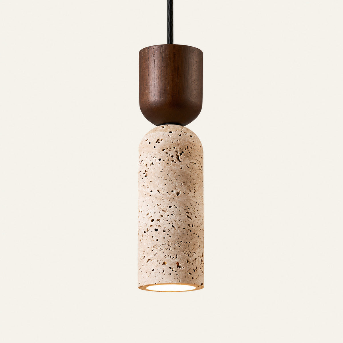 The Tappo travertine pendant light, a slim stone cylinder with a walnut cap