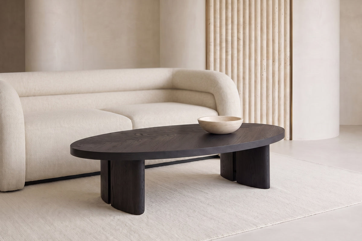 The Arezzo Oval Coffee Table in a living room setting
