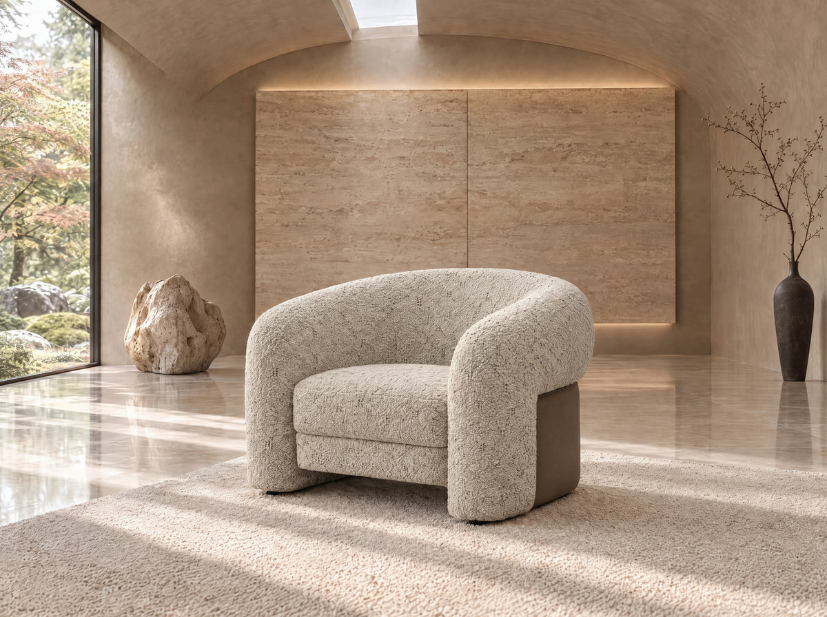 The Belluno Accent Chair in textured bouclé with leather side panel