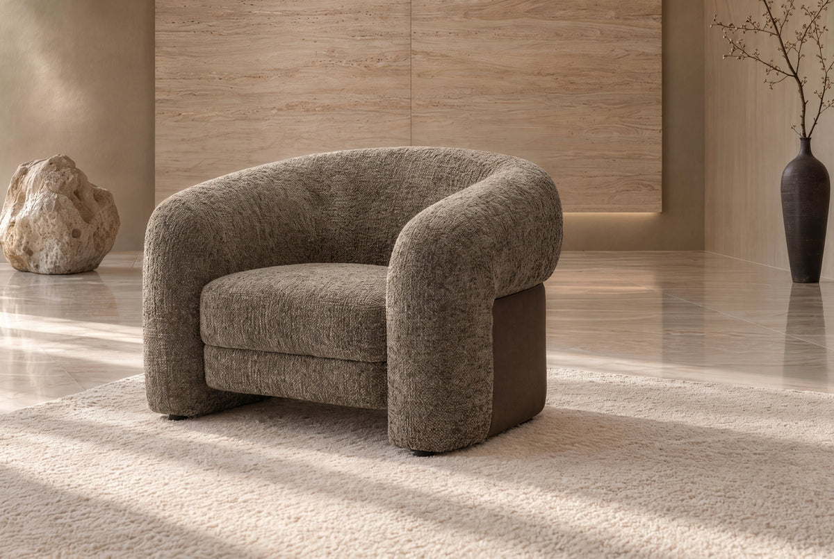 The Belluno Accent Chair in textured bouclé in a living room