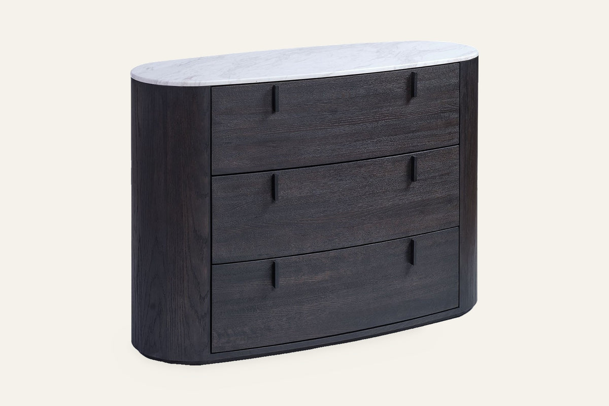 The Bolsena Oval Stone Chest of Drawers, angled view