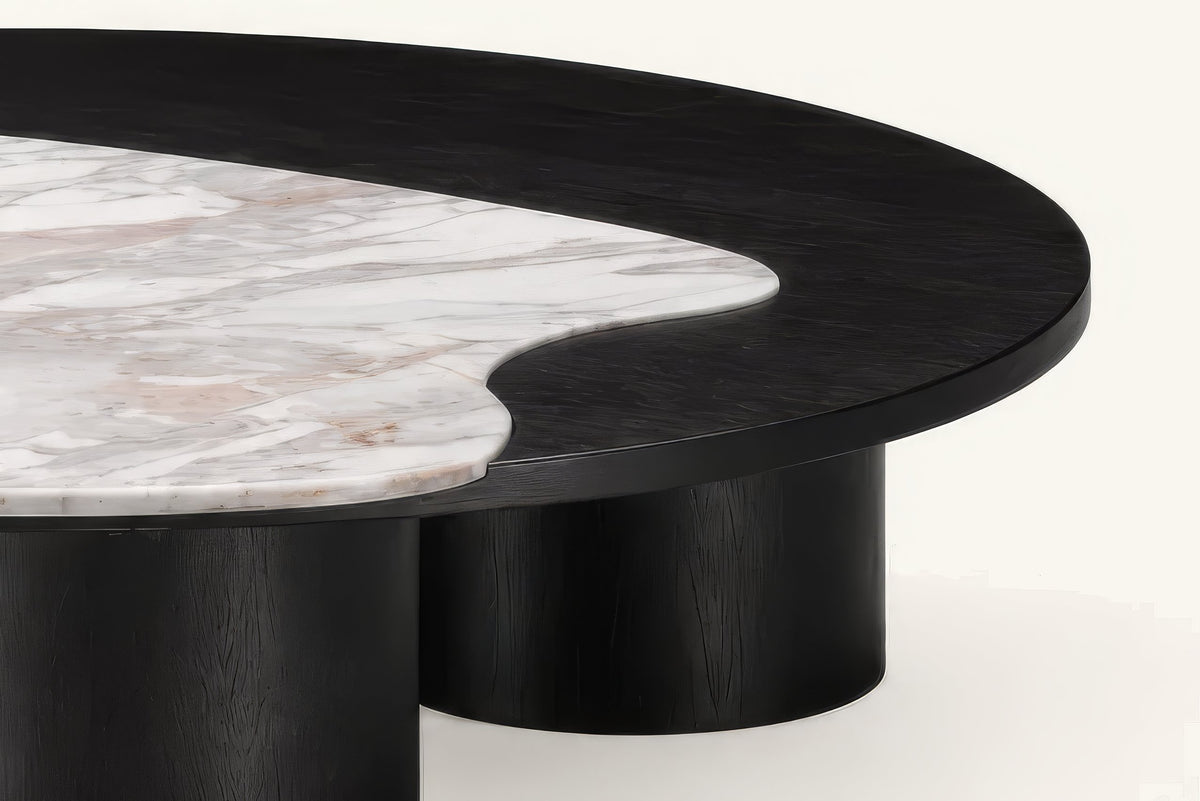 The Caldera Coffee Table, veined stone and black timber frame close-up