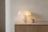 The Calotta Marble Table Lamp in a room setting