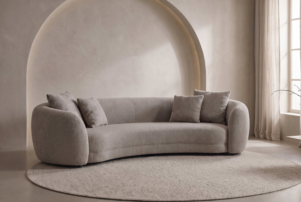 The Capri Sofa in oatmeal bouclé in a living room