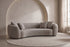 The Capri Sofa in oatmeal bouclé in a living room