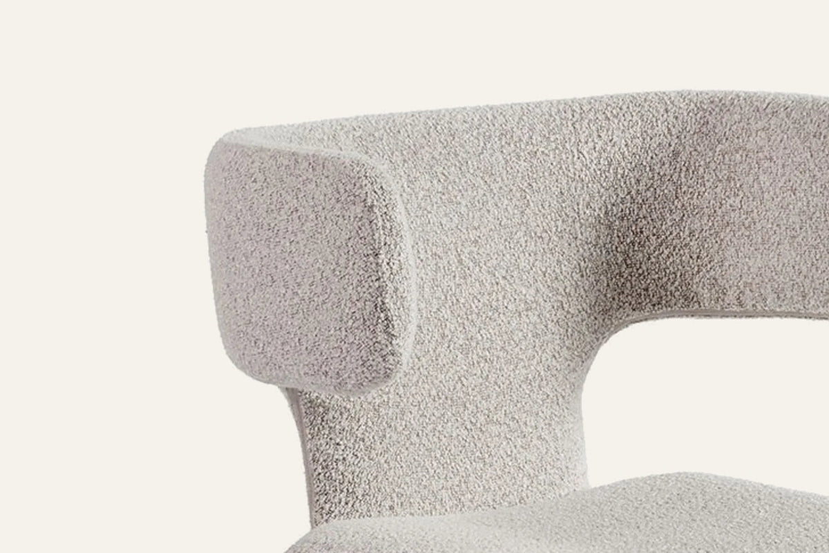 The Cetona Dining Chair, winged back and boucle detail