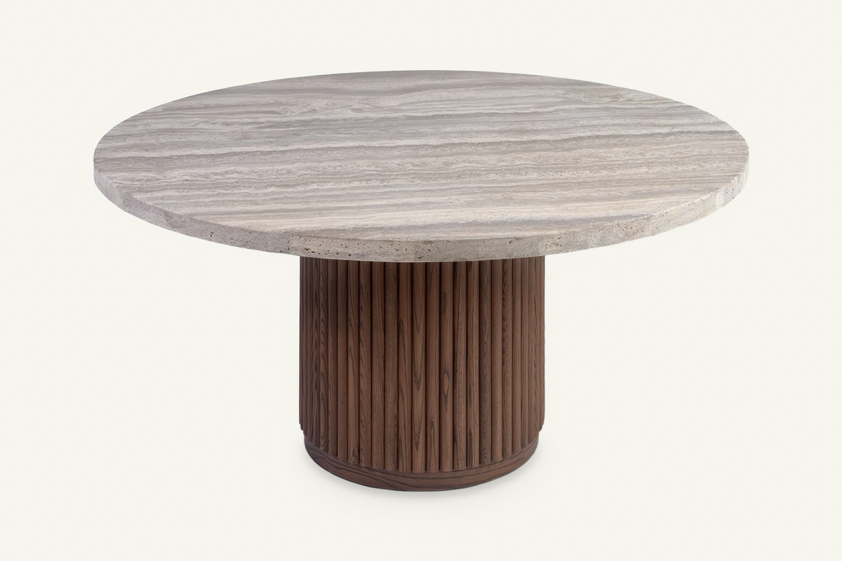 The Chiusi Travertine Round Dining Table, angled view