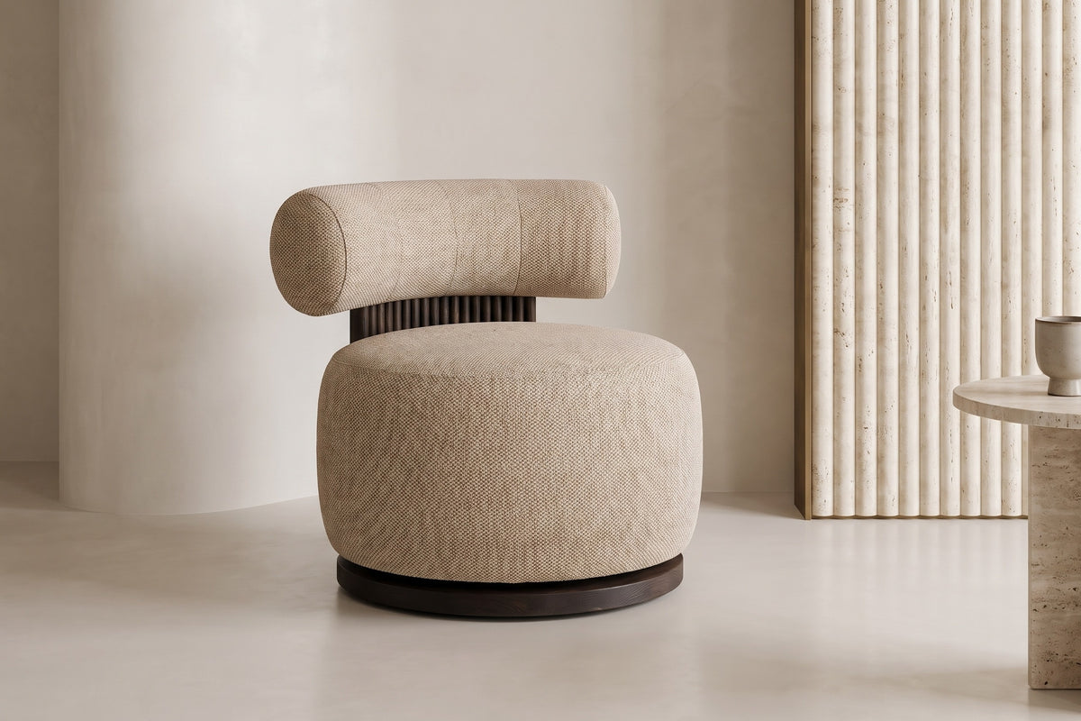 The Cortona Swivel Chair in toasted beige textured weave in a living room setting