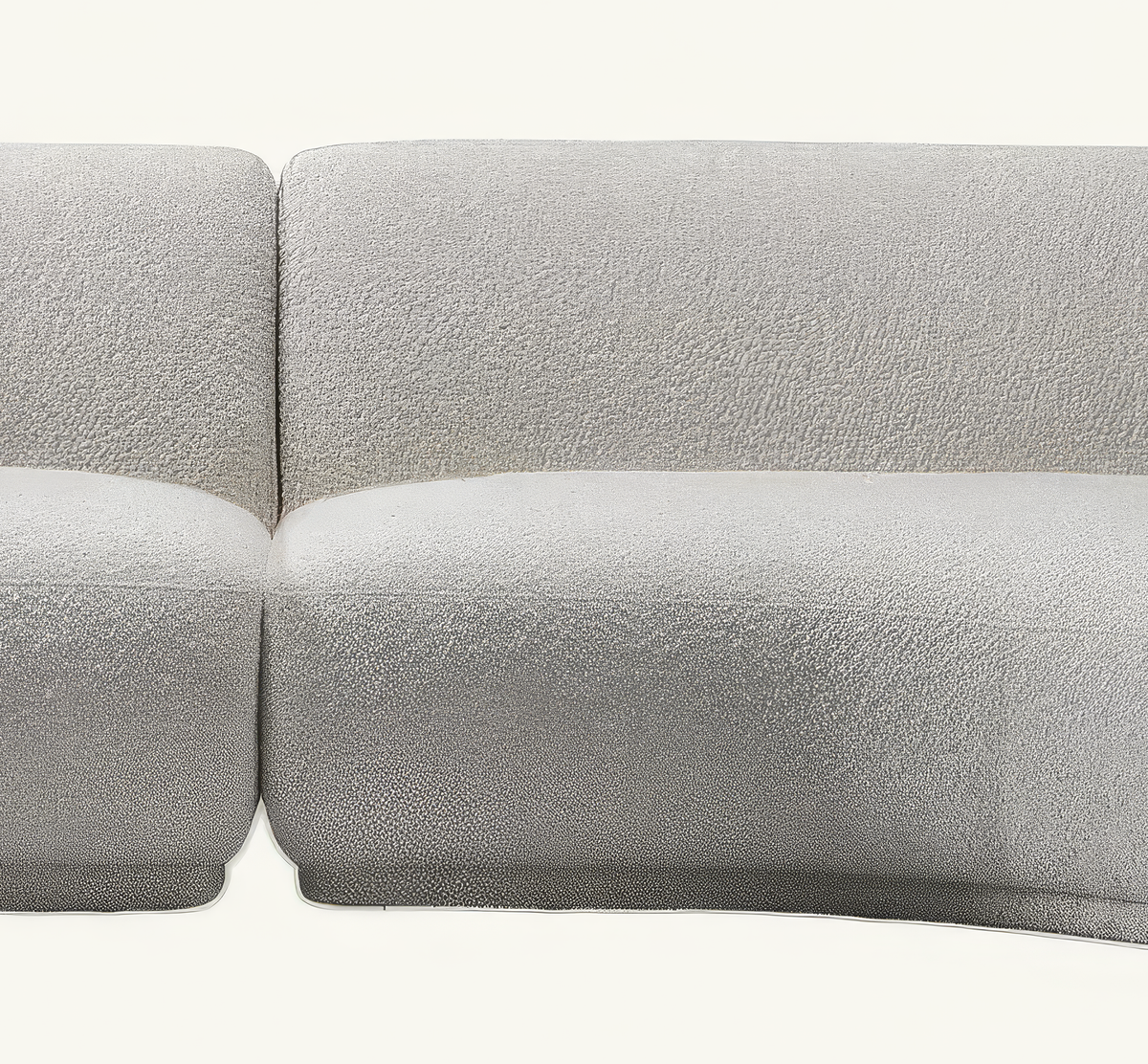 The Elira Sofa, close-up of the ivory bouclé seat and cushion