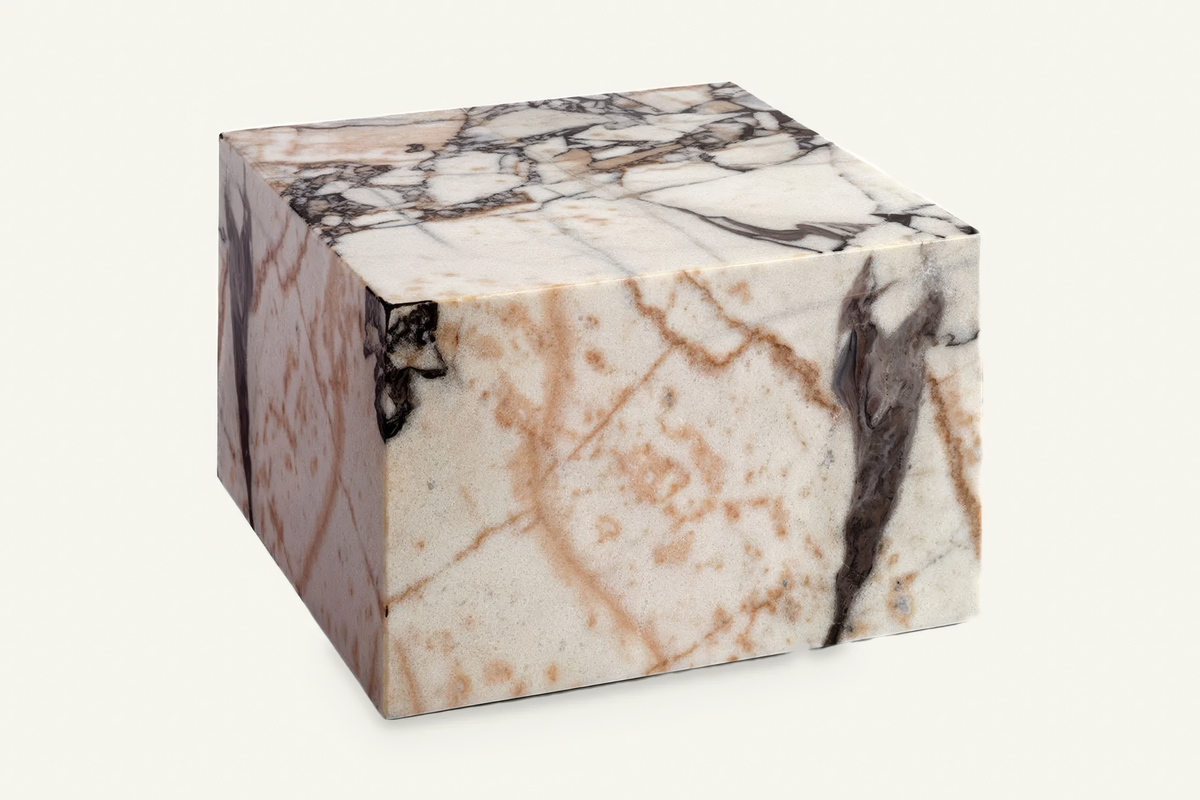 The Luni Marble Side Table, angled view