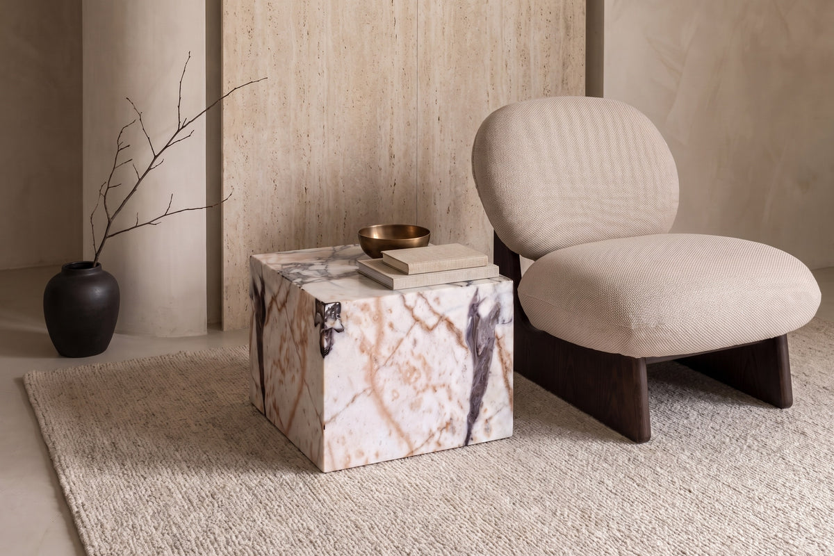 The Luni Marble Side Table in a living room setting