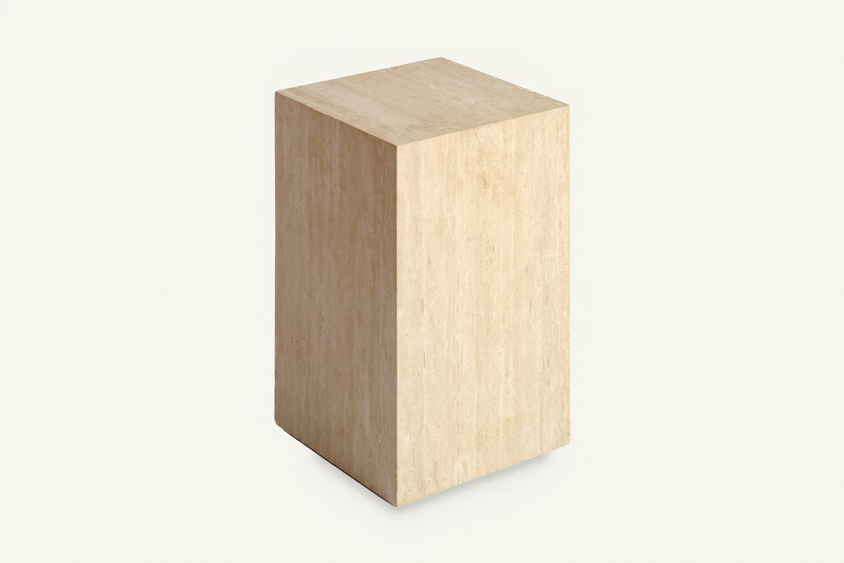 The Luni Travertine Side Table, angled view