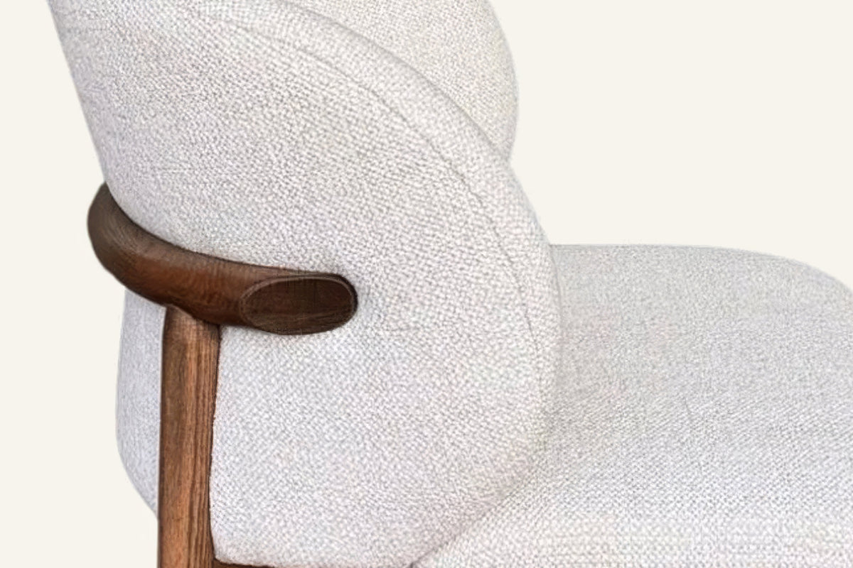 The Norcia Dining Chair, timber rail and boucle detail