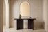 The Sestri Marble Console Table in an arched plaster entrance hall