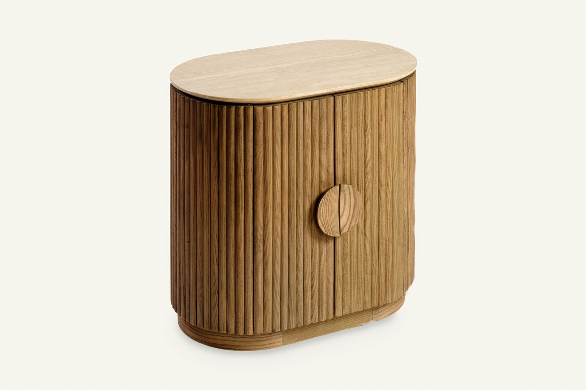 The Spello Fluted Travertine Bedside Cabinet, angled view